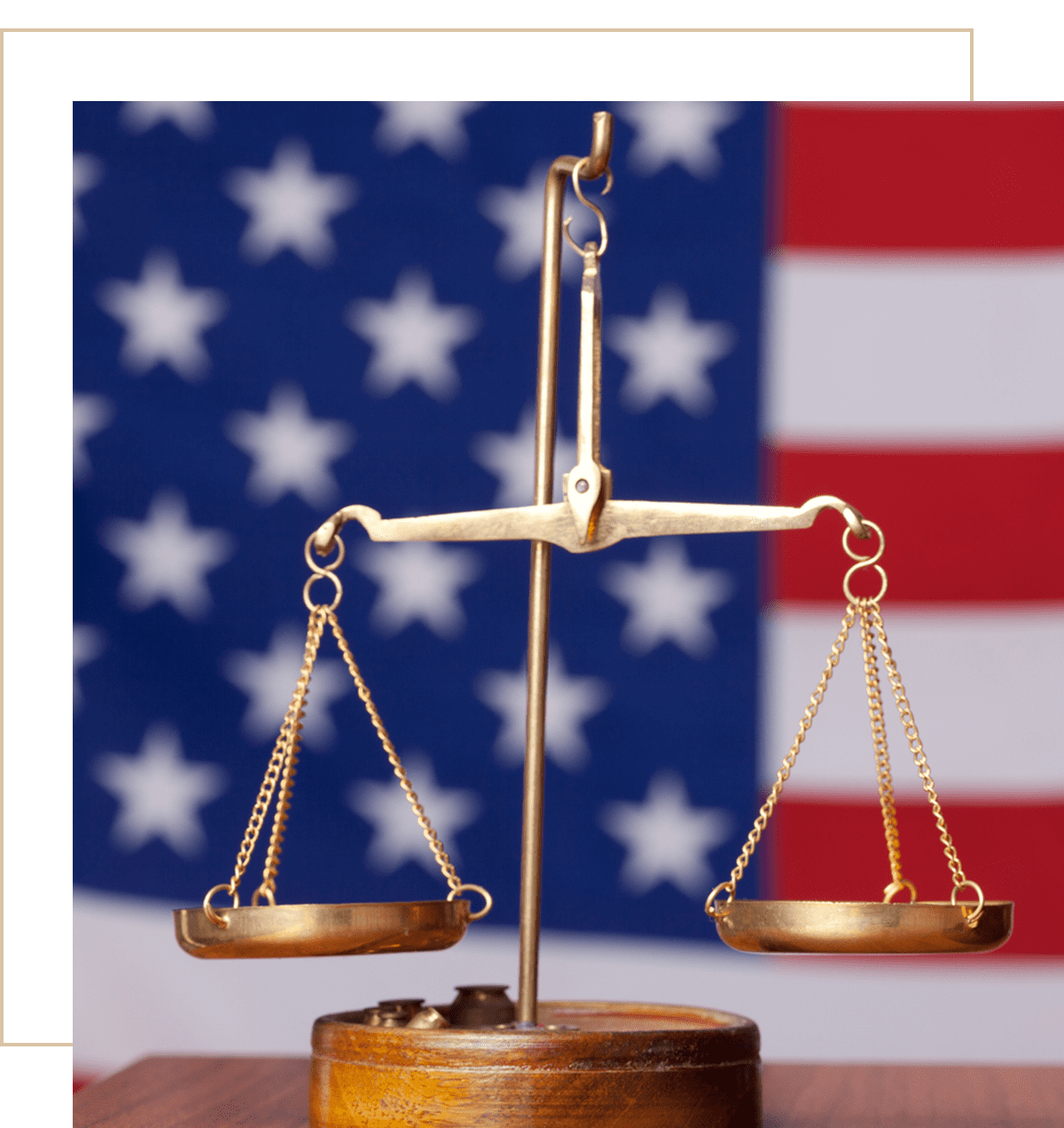 Balance scales and USA flag backdrop